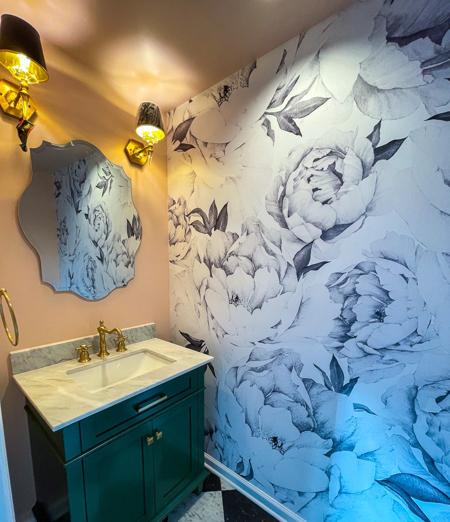 Green vanity and a floral mural, a bathroom remodel by Sidney Design and Build in Winchester, VA