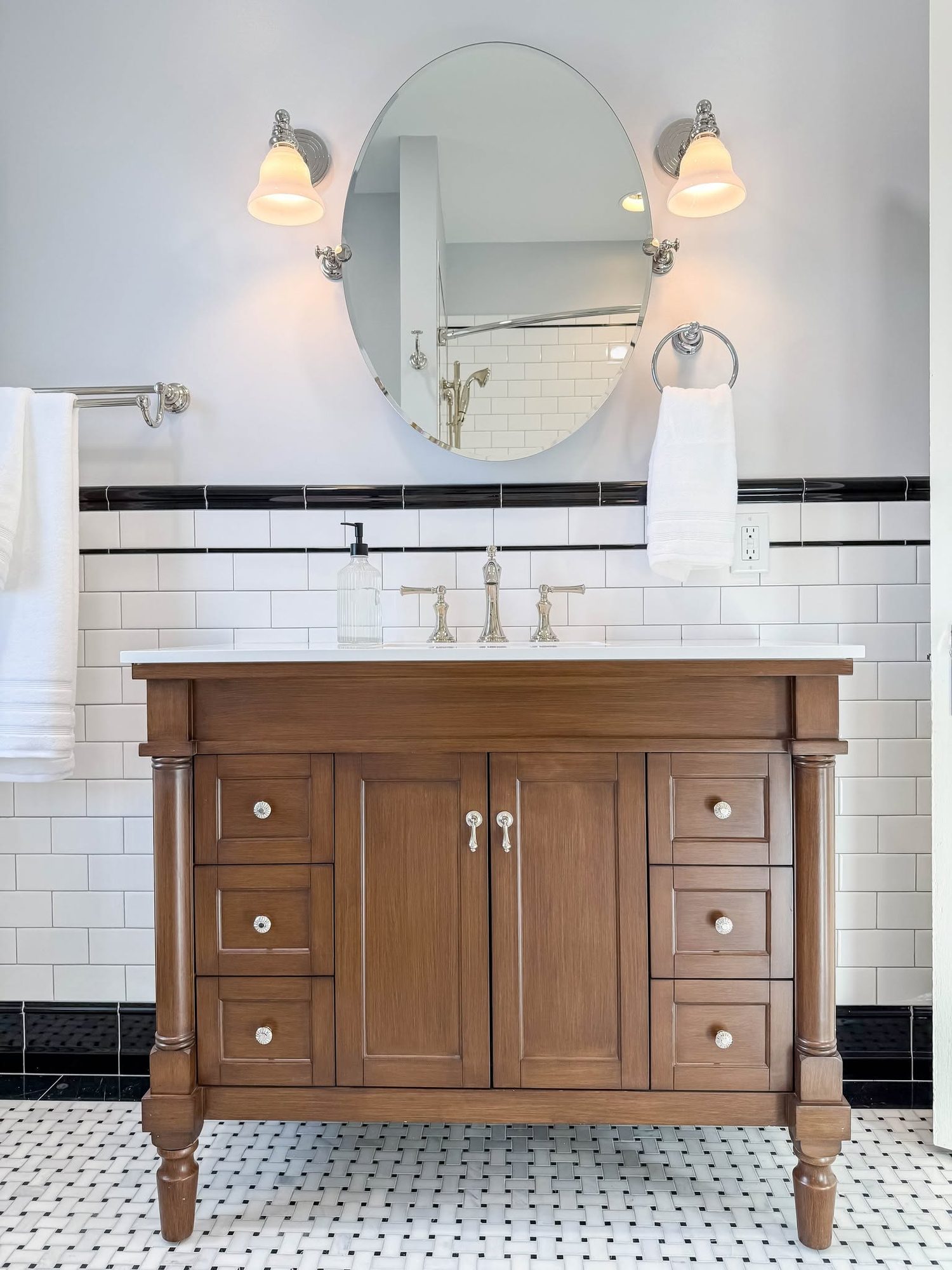 Furniture style vanity and subway tile, a bathroom remodel by Sidney Design and Build in Winchester, VA