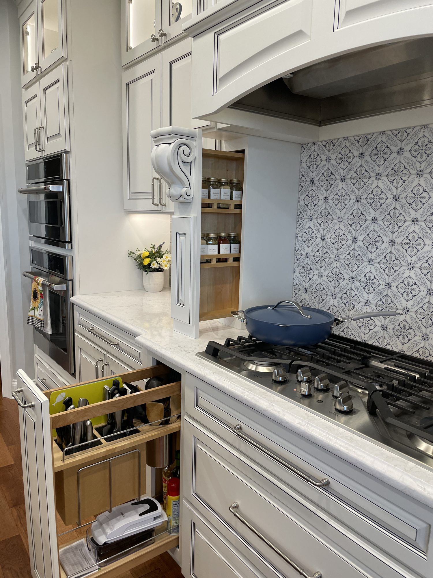 Pull out spice storage beside the range, a kitchen remodel by Sidney Design and Build in Winchester, VA