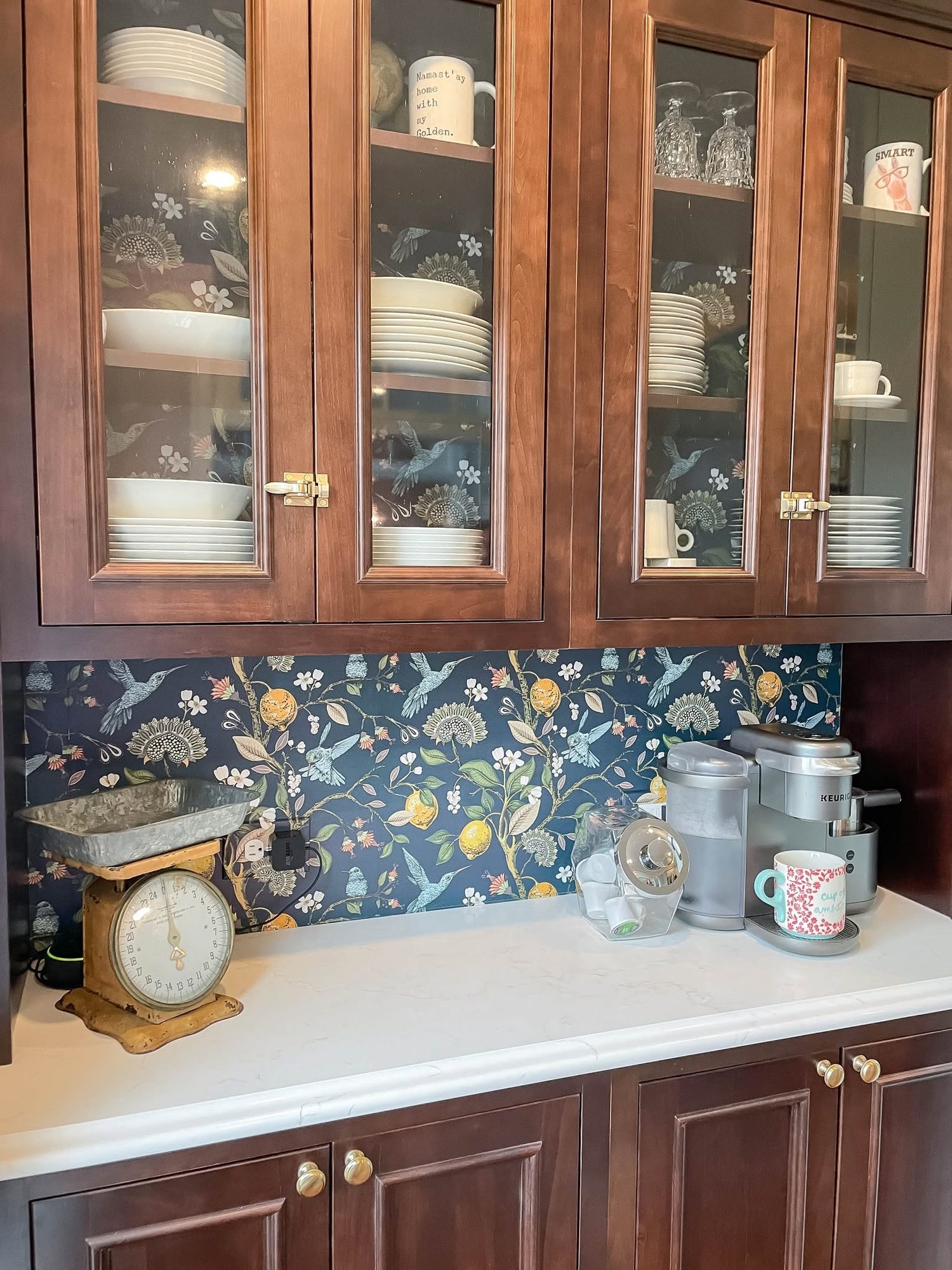 Stained glass front cabinets and a mosaic backsplash, a kitchen remodel by Sidney Design and Build in Winchester, VA