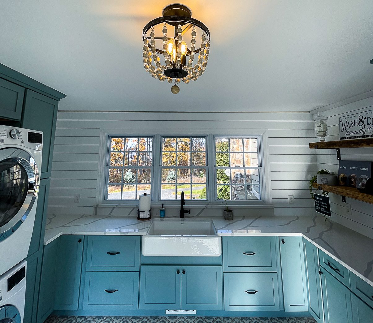 Laundry room with a farmhouse sink, a laundry room remodel by Sidney Design and Build in Winchester, VA