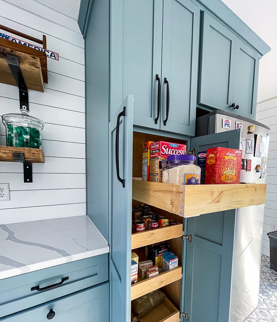 Pull out pantry in the laundry room, a laundry room remodel by Sidney Design and Build in Winchester, VA
